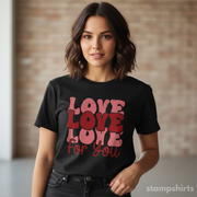 Woman wearing a black t-shirt with 'LOVE LOVE LOVE for you' text in red.