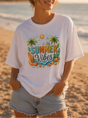Woman wearing a 'Summer Vibes' t-shirt on a beach