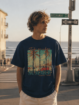 Man wearing a navy blue t-shirt with a beach graphic and 'Summer' text, standing on a street near the ocean. thumbnail 3