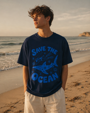 Person wearing a 'Save the Ocean' t-shirt on a beach