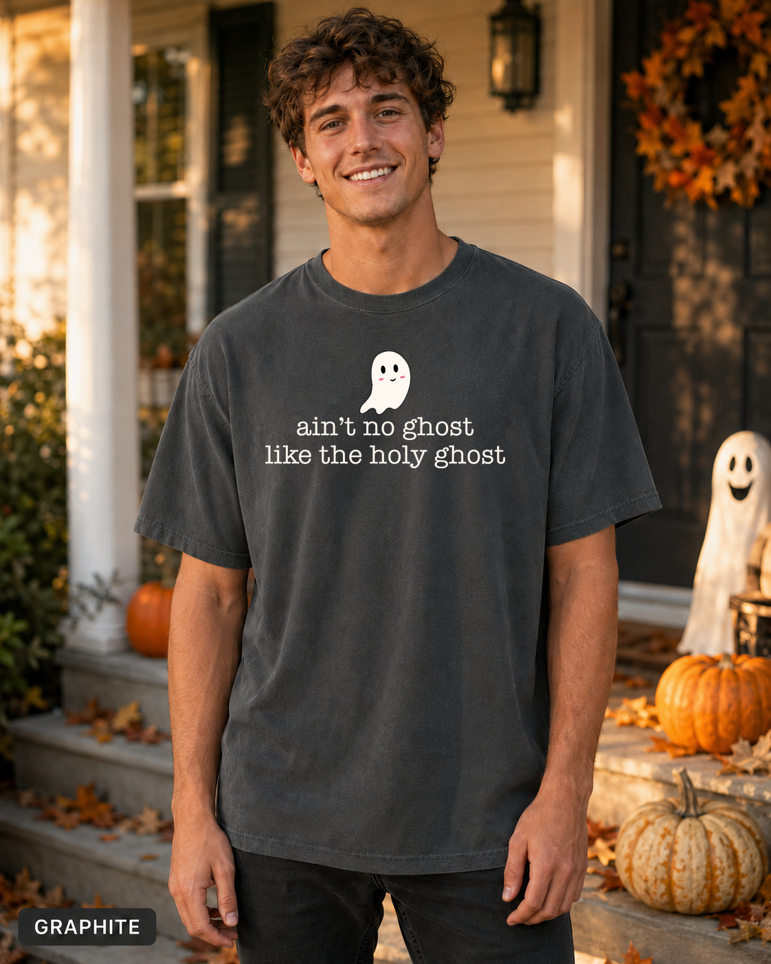 Male model wearing Graphite Ain't No Ghost Like the Holy Ghost Halloween T-shirt