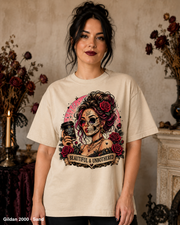 Female model wearing the Gildan 2000 Sand Beautiful & Unbothered gothic skull T-shirt