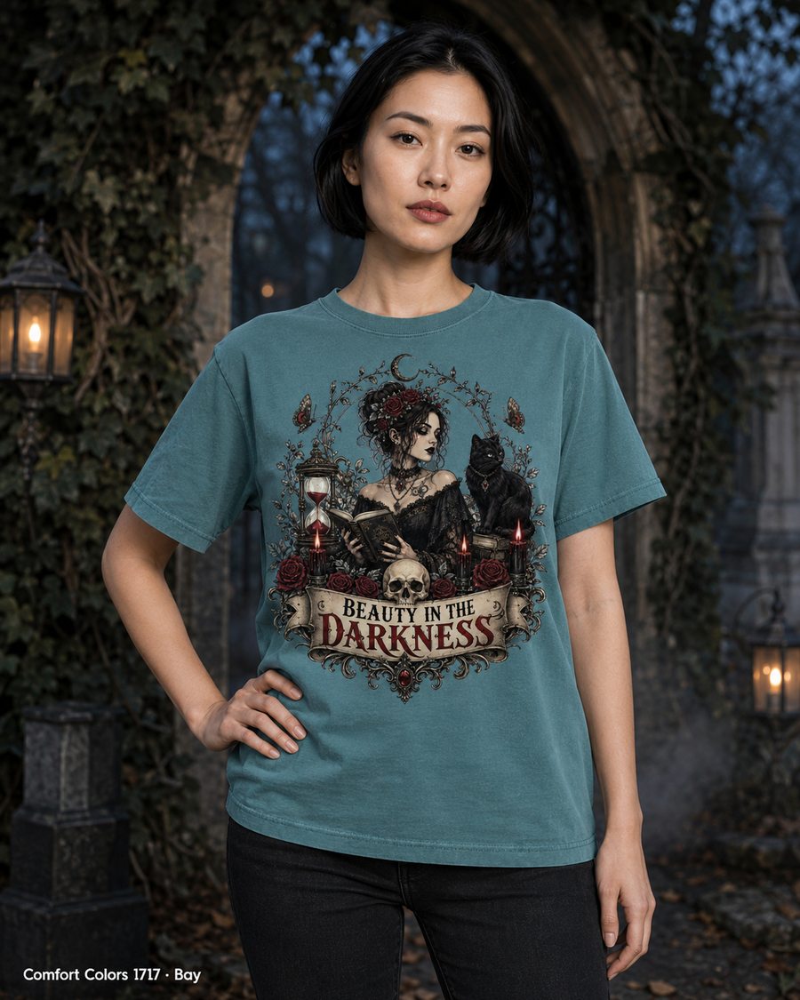 Female model wearing the Comfort Colors 1717 Bay Beauty in the Darkness gothic T-shirt