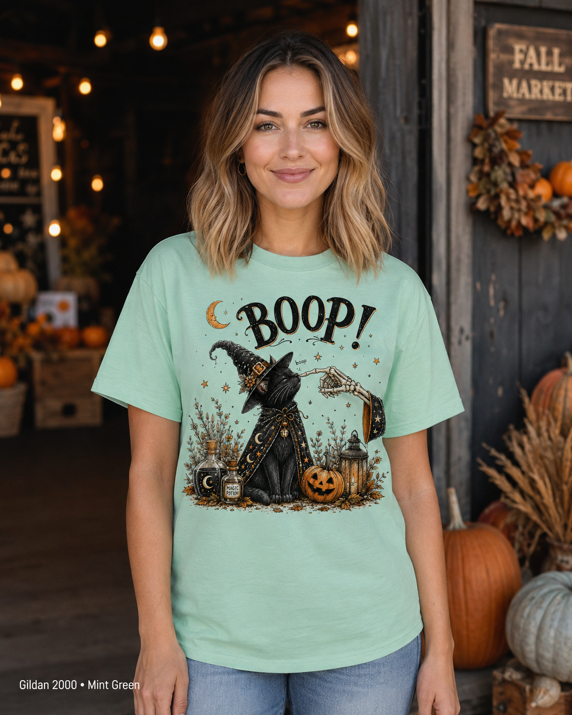 Boop Witch Cat Vintage Halloween T-Shirt — Gildan 2000 Mint Green — female model