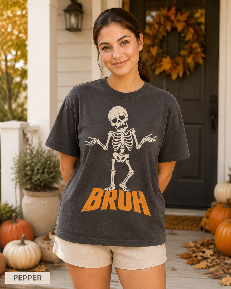 Female model wearing Pepper BRUH shrugging skeleton Halloween T-shirt