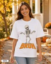 Female model wearing White BRUH shrugging skeleton Halloween T-shirt