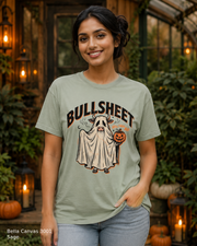 Female model wearing the Bella Canvas 3001 Sage Bullsheet Ghost Cow Halloween T-shirt