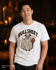 Male model wearing the Bella Canvas 3001 White Bullsheet Ghost Cow Halloween T-shirt