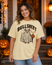 Female model wearing the Comfort Colors 1717 Butter Bullsheet Ghost Cow Halloween T-shirt