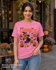 Female model wearing Oh My Gourdness Halloween skeleton T-shirt - Bella+Canvas 3001 - Charity Pink