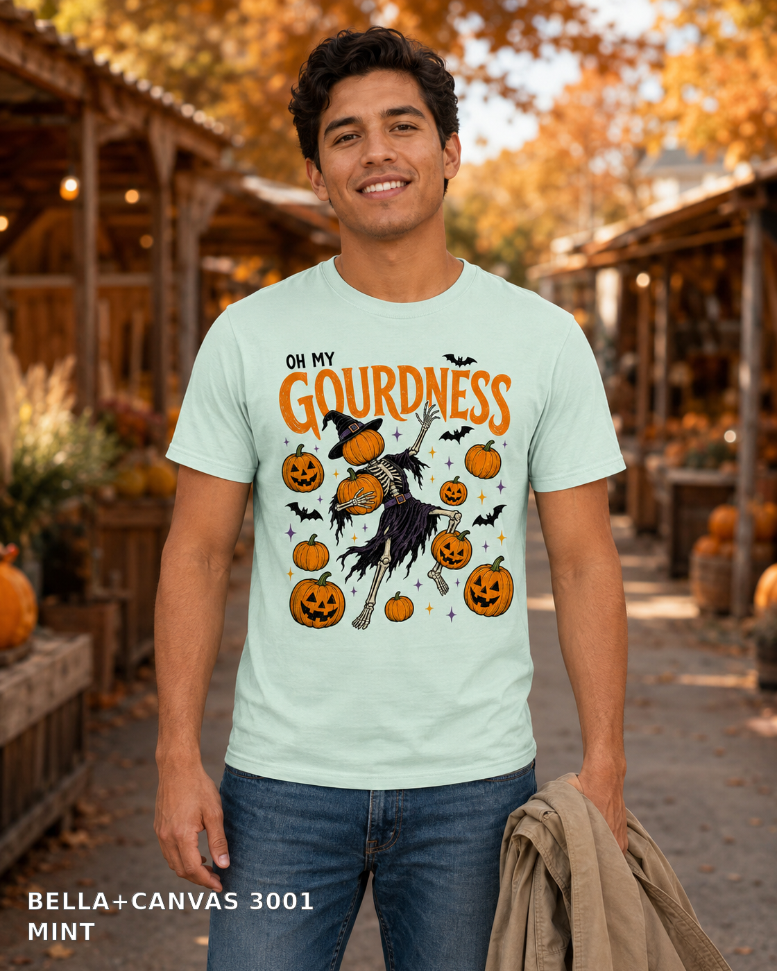 Male model wearing Oh My Gourdness Halloween skeleton T-shirt - Bella+Canvas 3001 - Mint