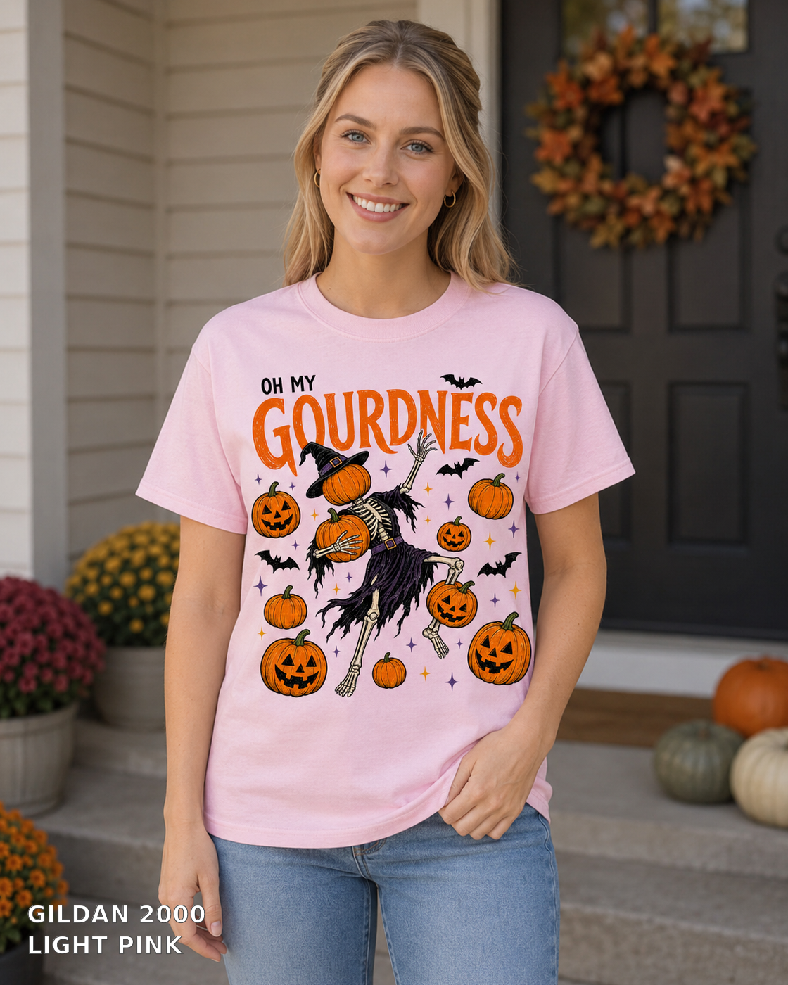 Female model wearing Oh My Gourdness Halloween skeleton T-shirt - Gildan 2000 - Light Pink