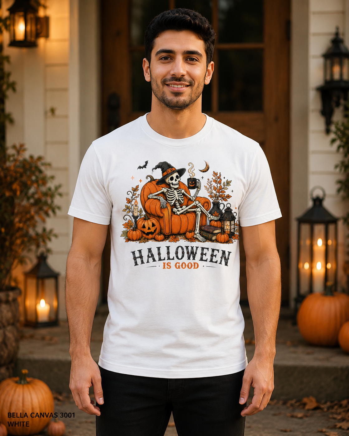 Male model wearing the Bella Canvas 3001 White Halloween Is Good skeleton pumpkin chair T-shirt