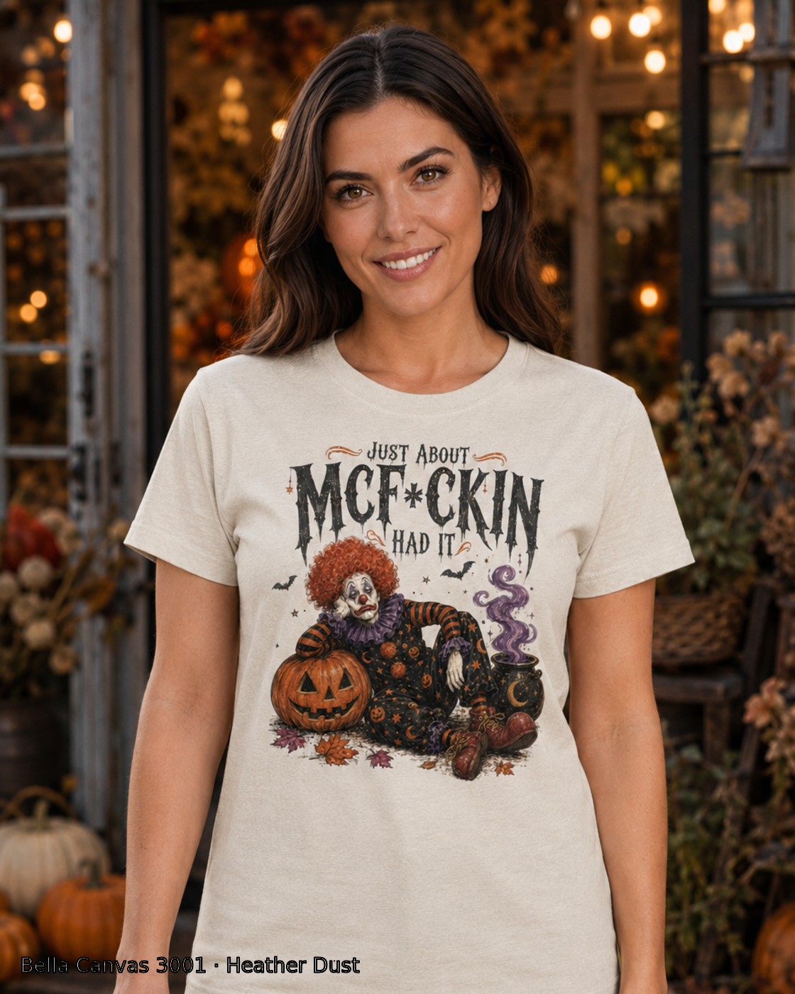 Female model wearing the Bella Canvas 3001 Heather Dust Just About McF*ckin Had It Halloween clown T-shirt