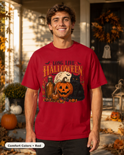 Male model wearing Long Live Halloween black cat and pumpkin T-shirt in Comfort Colors Red