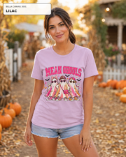 Female model wearing Mean Ghouls pink ghost Halloween T-shirt in Bella Canvas Lilac