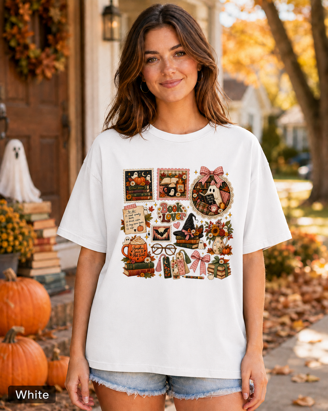 Woman wearing a White Spooky Book Lover ghost Halloween T-shirt