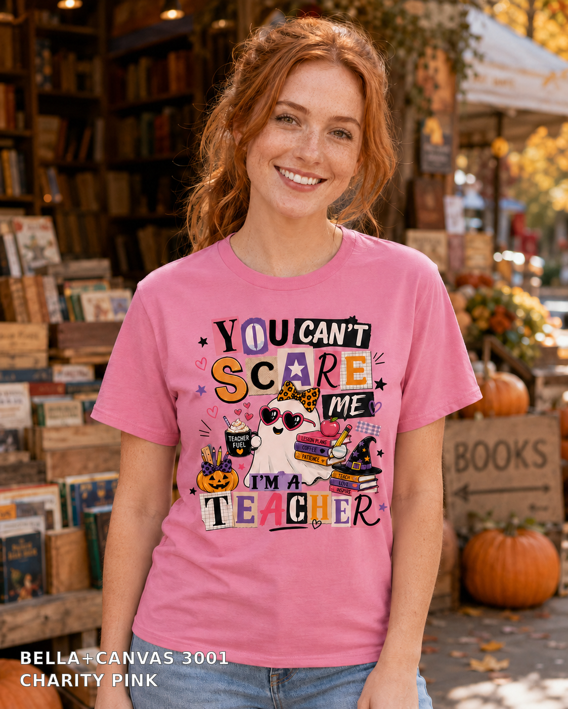 Female model wearing You Can't Scare Me I'm a Teacher Halloween T-shirt - Bella+Canvas 3001 - Charity Pink