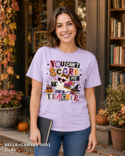 Female model wearing You Can't Scare Me I'm a Teacher Halloween T-shirt - Bella+Canvas 3001 - Lilac