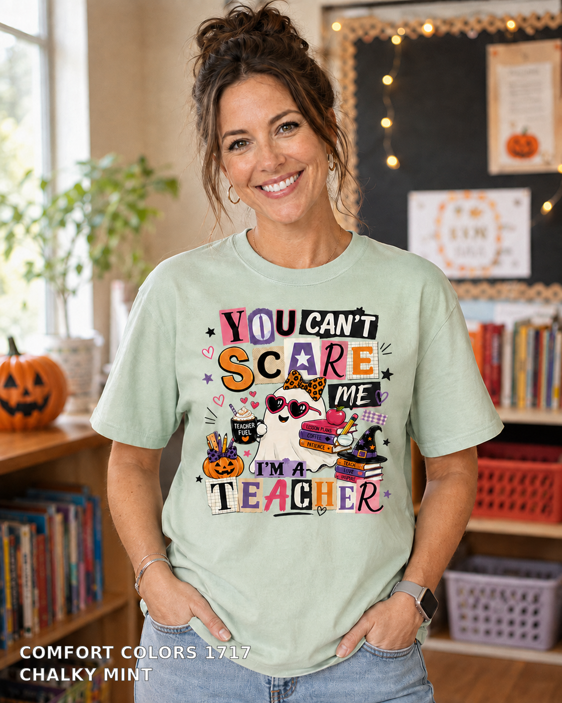 Female model wearing You Can't Scare Me I'm a Teacher Halloween T-shirt - Comfort Colors 1717 - Chalky Mint