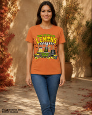 Female model wearing Bella Canvas 3001 Burnt Orange When Life Gives You Lemons skeleton Halloween T-shirt, corrected artwork