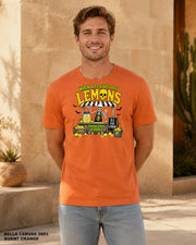 Male model wearing Bella Canvas 3001 Burnt Orange When Life Gives You Lemons skeleton Halloween T-shirt, corrected artwork