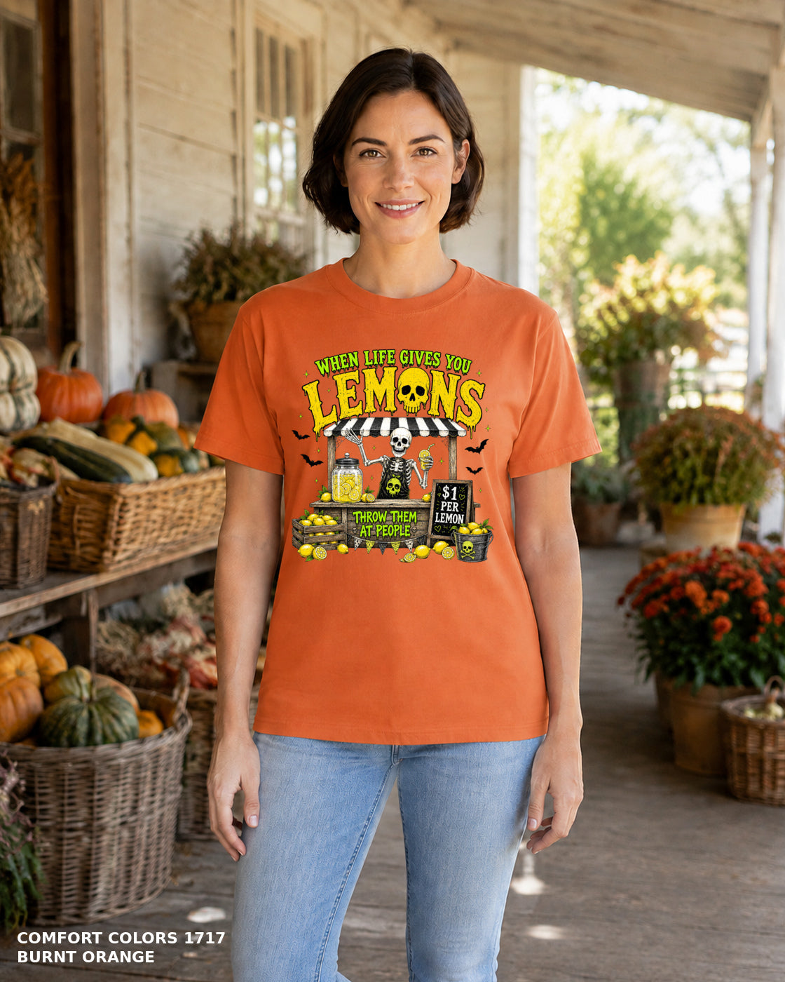 Female model wearing Comfort Colors 1717 Burnt Orange When Life Gives You Lemons skeleton Halloween T-shirt, corrected artwork