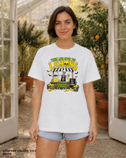 Female model wearing Comfort Colors 1717 White When Life Gives You Lemons skeleton Halloween T-shirt, artwork positioned slightly lower