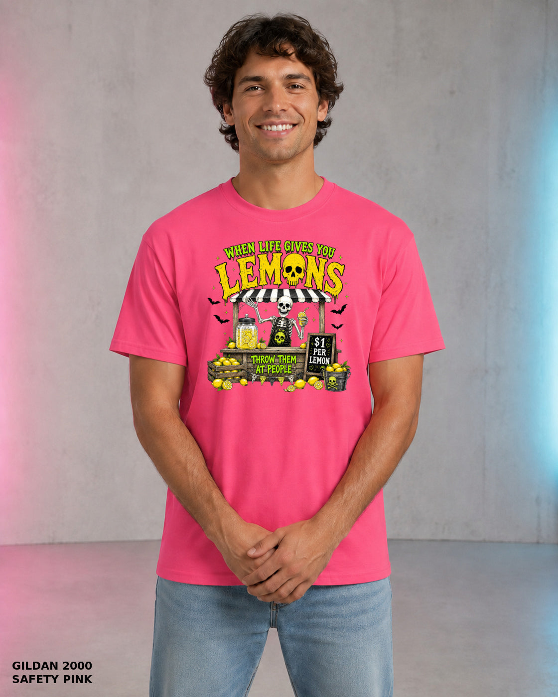 Male model wearing Gildan 2000 Safety Pink When Life Gives You Lemons skeleton Halloween T-shirt, corrected artwork