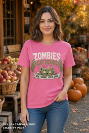 Female model wearing the Bella Canvas 3001 Charity Pink Zombies Eat Brains funny Halloween T-shirt