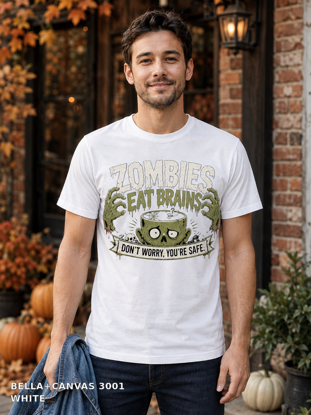 Male model wearing the Bella Canvas 3001 White Zombies Eat Brains funny Halloween T-shirt