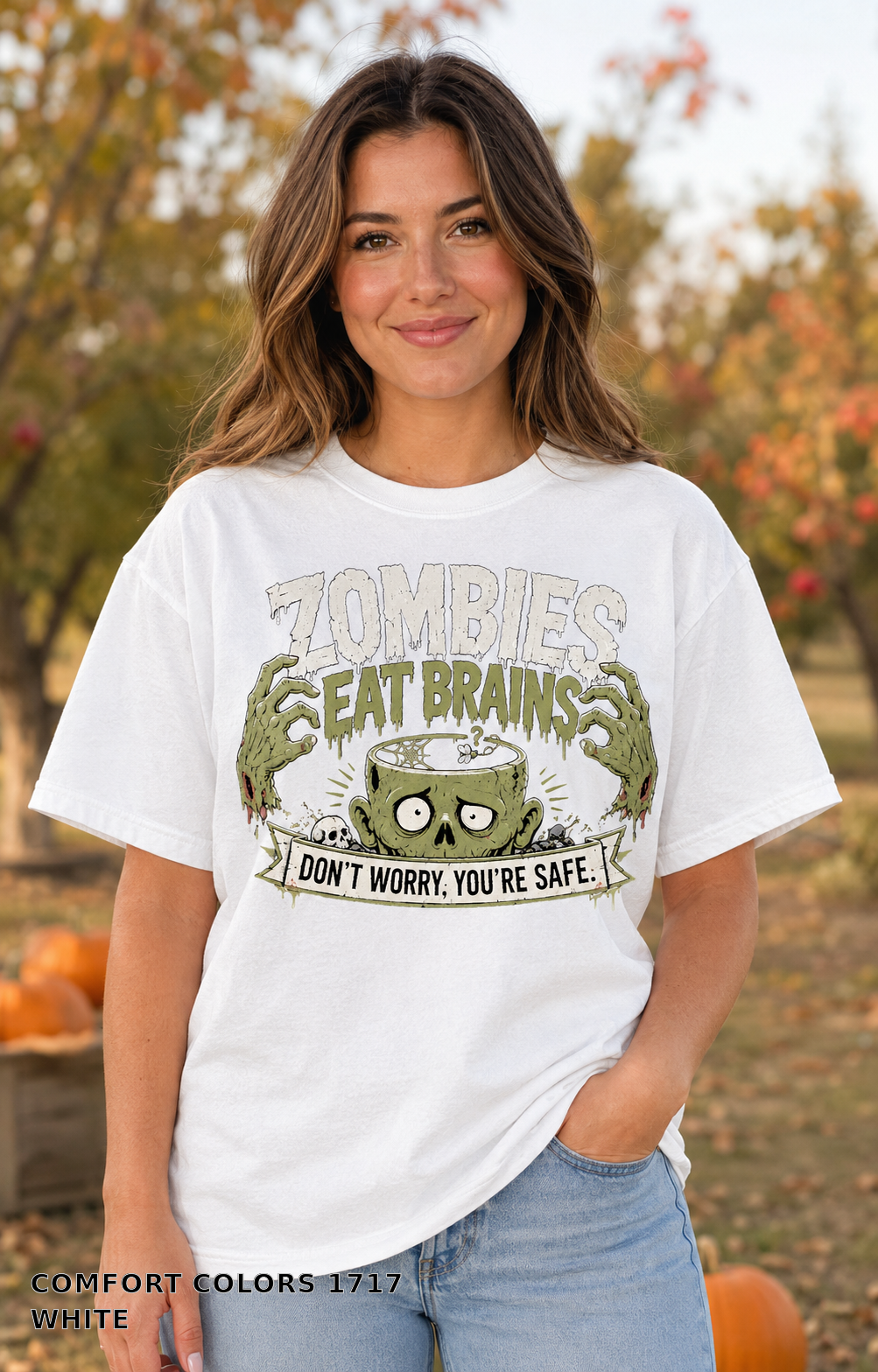 Female model wearing the Comfort Colors 1717 White Zombies Eat Brains funny Halloween T-shirt