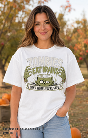 Female model wearing the Comfort Colors 1717 White Zombies Eat Brains funny Halloween T-shirt