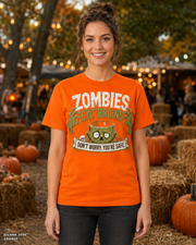 Female model wearing the Gildan 2000 Orange Zombies Eat Brains funny Halloween T-shirt