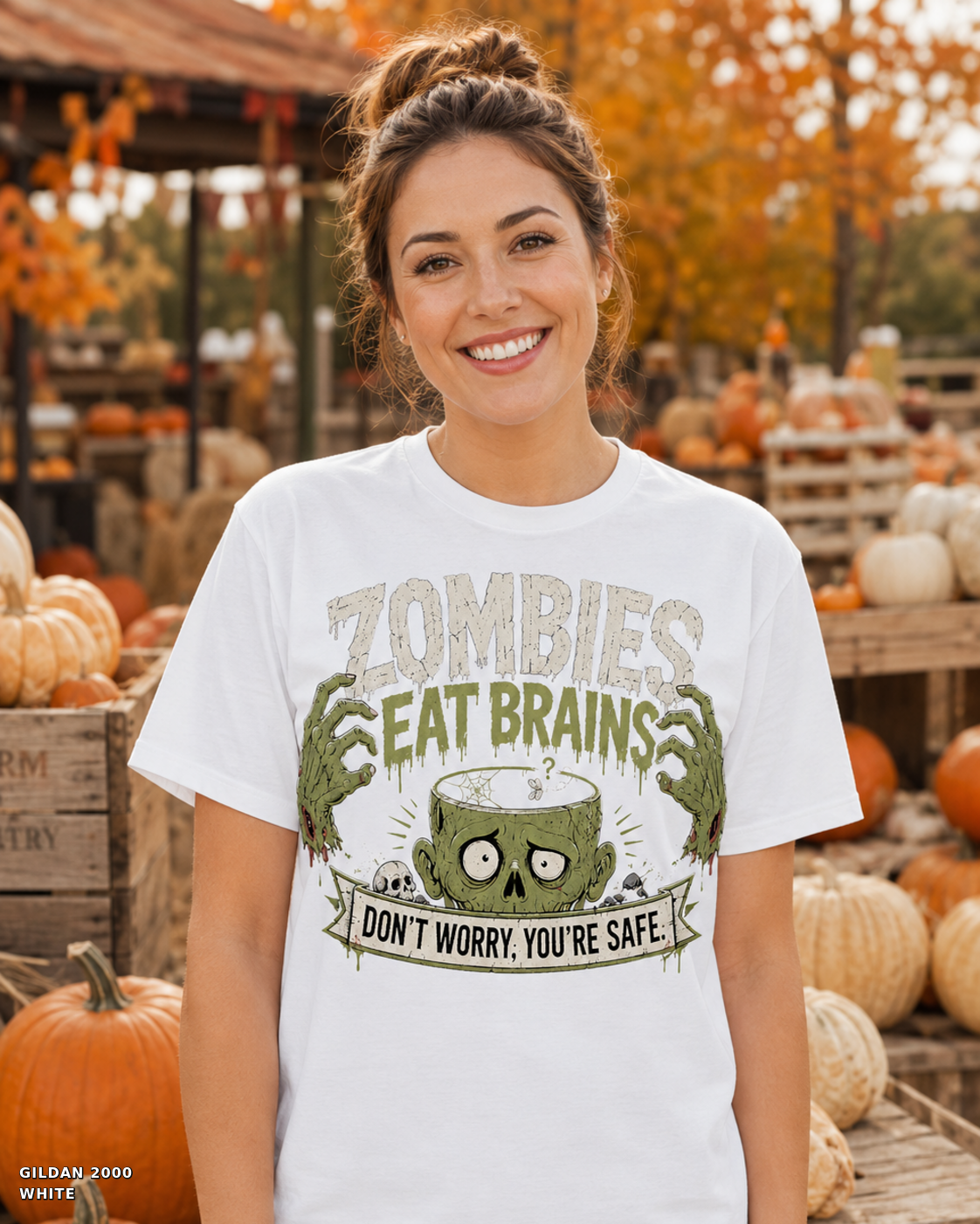 Female model wearing the Gildan 2000 White Zombies Eat Brains funny Halloween T-shirt